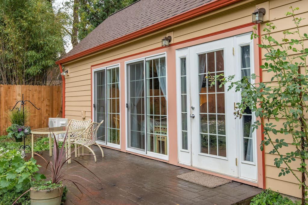 Patio seating outside the the sliding glass doors.