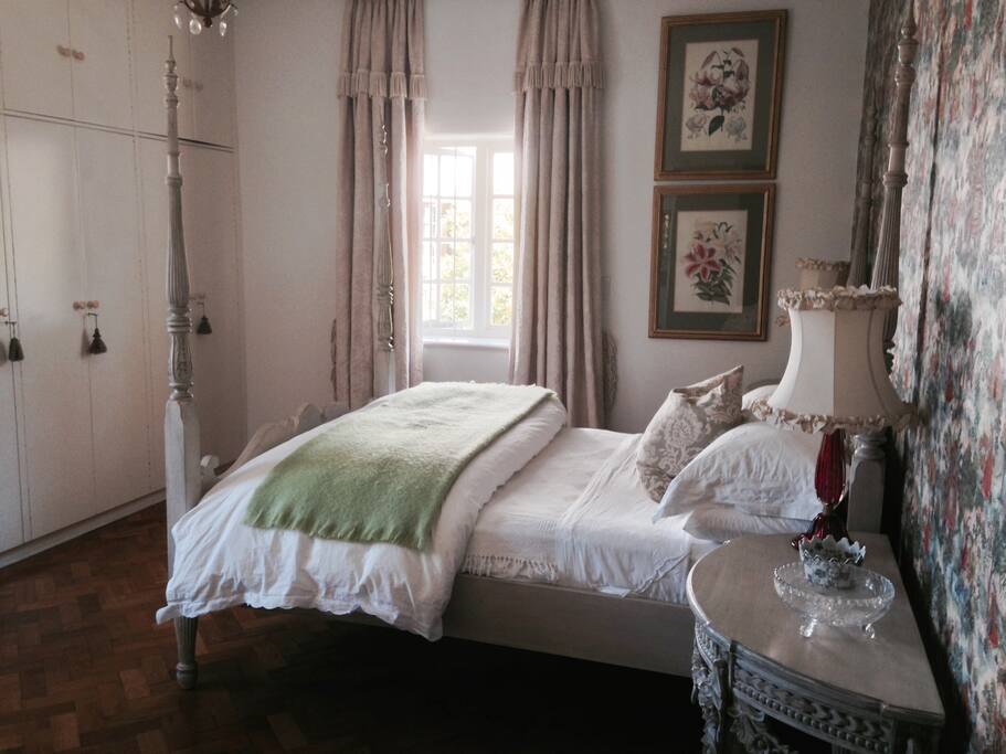 Main bedroom with private balcony.