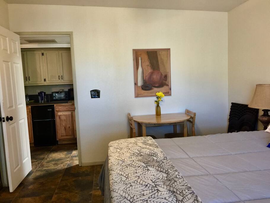 From bedroom into kitchen