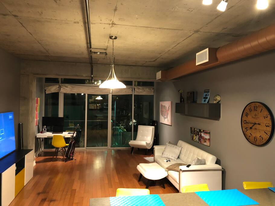 Spacious living room with a 70 inch TV