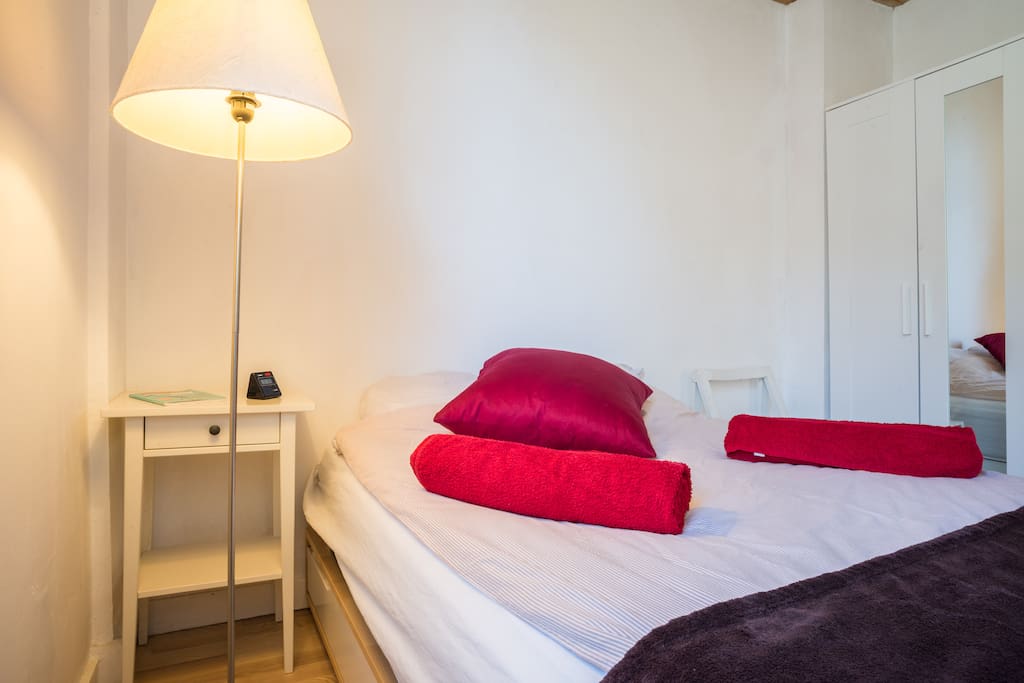 Double bed with wardrobe and storage, view of the mountains.