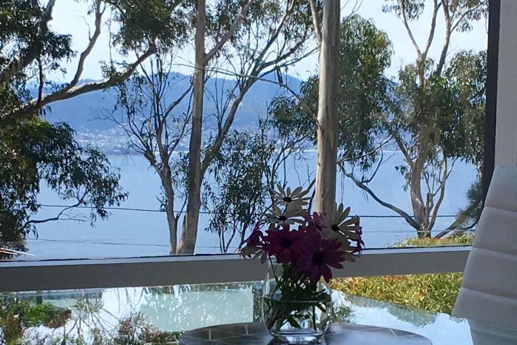 river, hills and gumtrees are the view from this home