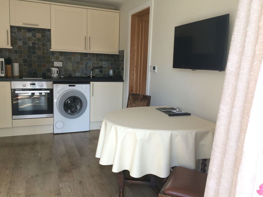 Sitting room/kitchen taken from patio doors