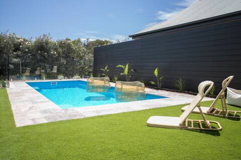 Coastal vibe with private pool close to beach.