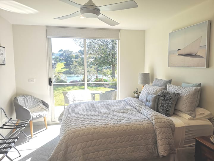 Your bedroom, with views and direct access to garden and lake