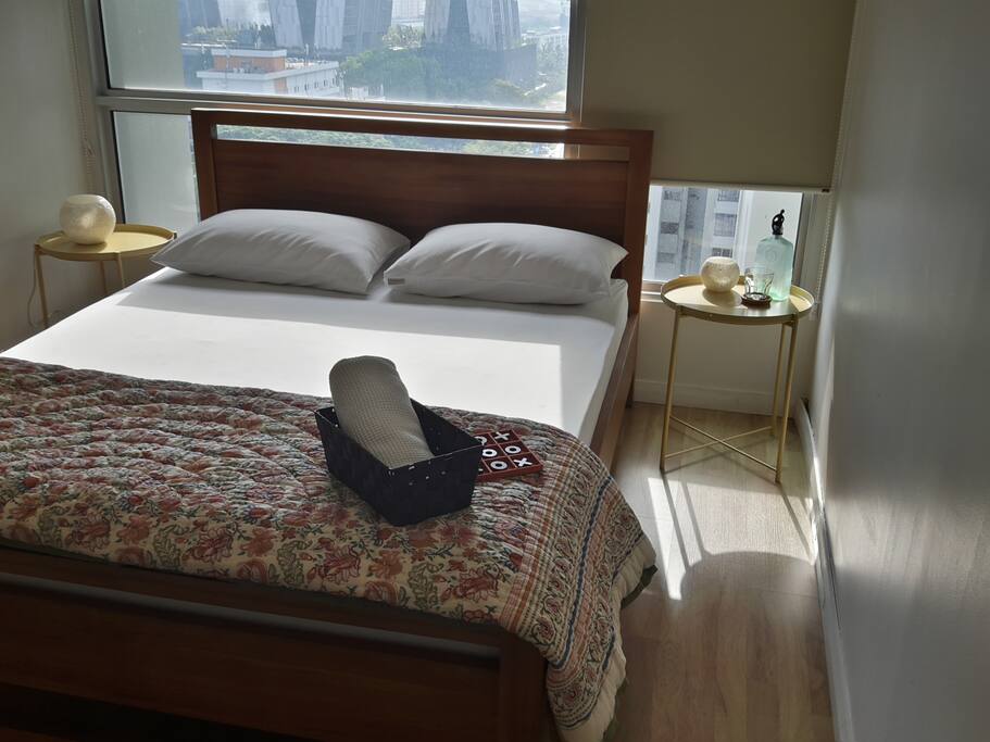 Your room :: A queen sized bed awaits along with an extra Napure contour pillow and cotton bath towels.
Includes black out blinds to keep the light out.