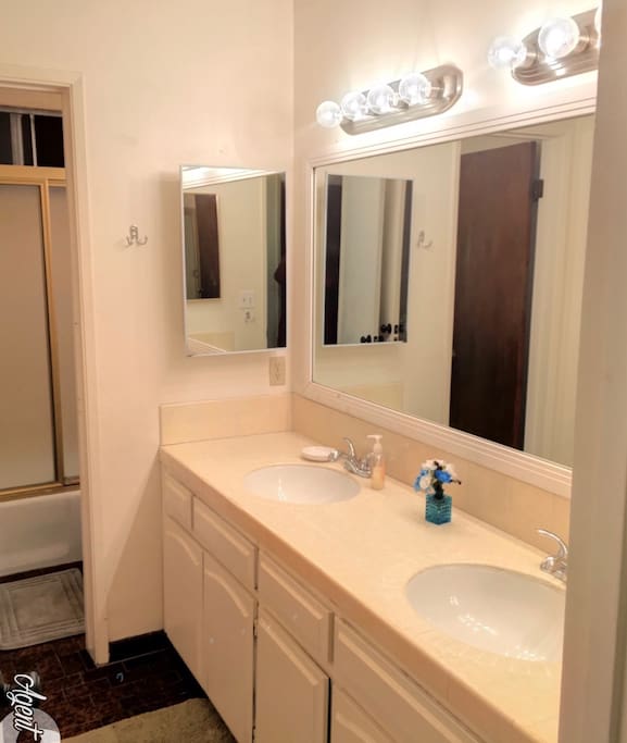 Attached Bathroom w/double sink & door to toilet & shower