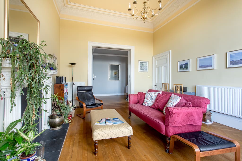 Traditional cornicing, gas fireplace and high ceilings. A great place to unwind!