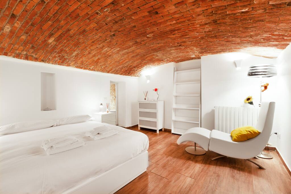 The Bedroom - The comfortable double bed with soft bed-linen and towels