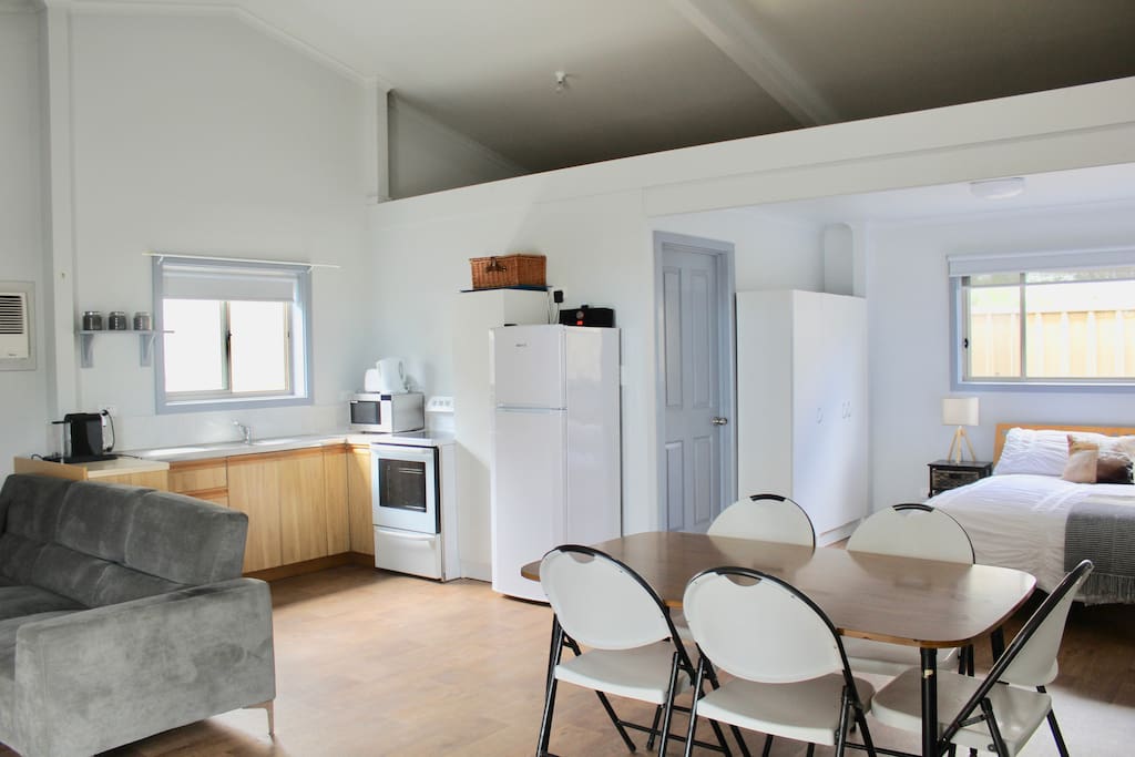 Studio style living area with main double bed.