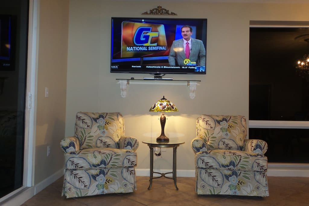 Living Room with 65" Flat Screen Smart TV
