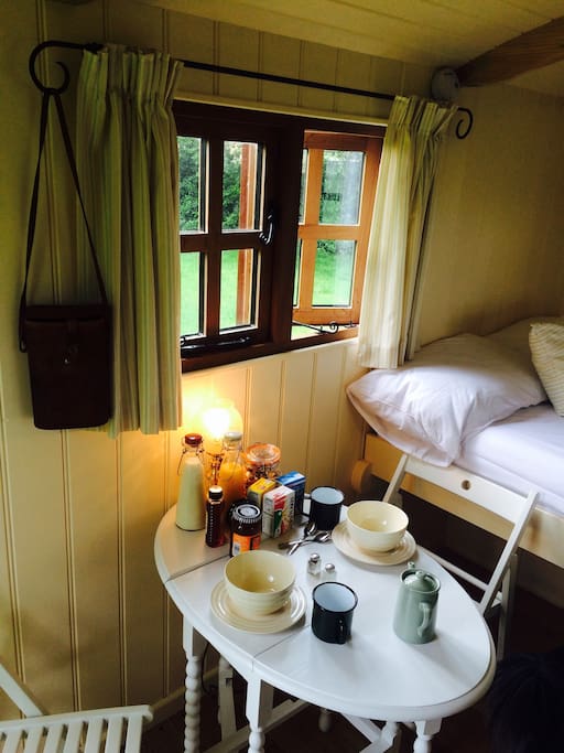 Breakfast time; basket containing milk, orange juice, local bread and other goodies delivered outside the hut each morning.
