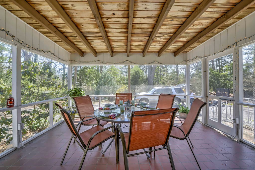 Relish in delicious home-cooked meals in the covered, screened-in porch.