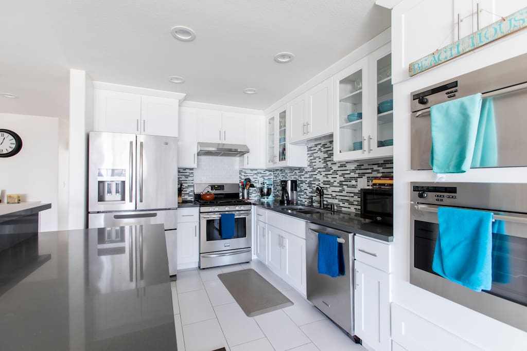 Open concept kitchen with ocean views perfect for you to cook and enjoy your time with family