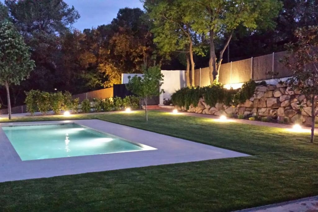 the beautiful swimming pool when the sun sets