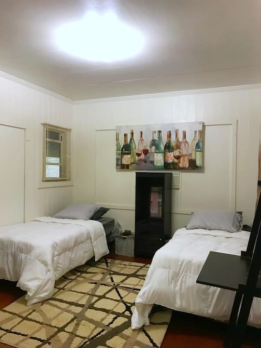 Two brand new twin beds that can be joined to make one Cal King size bed!