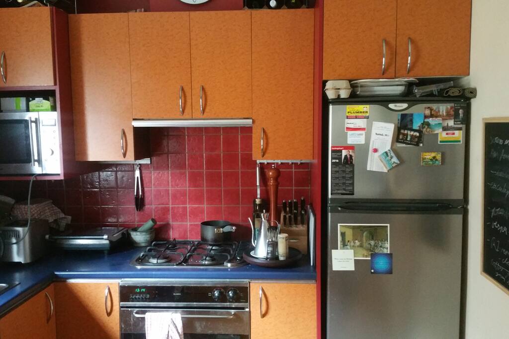 kitchen with microwave, oven & stovetop