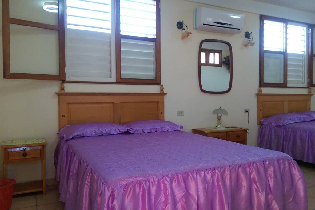 Bedroom with 2 beds each and Air conditioner