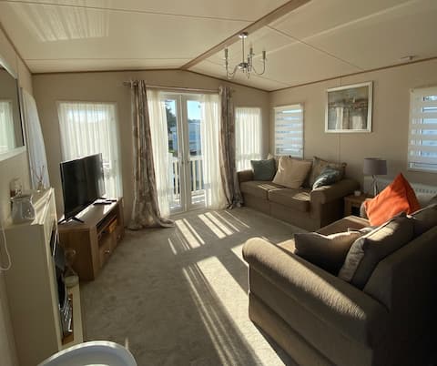 Popular Airbnb listing: Norfolk Caravan Staycation Cherry Tree HolidayPark in Burgh Castle