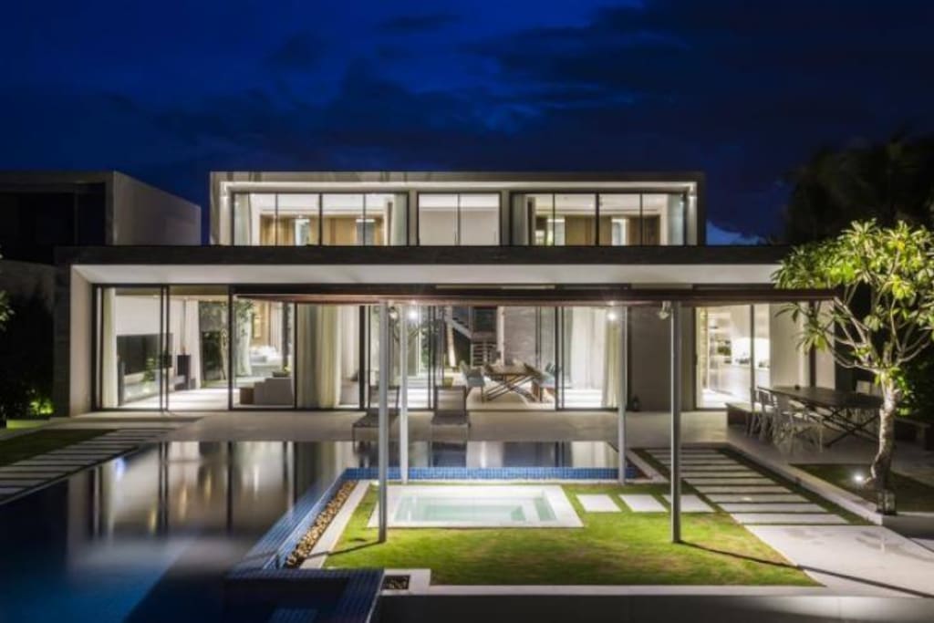 A luxury building with a modern. 2 floor and a private swimming pool
