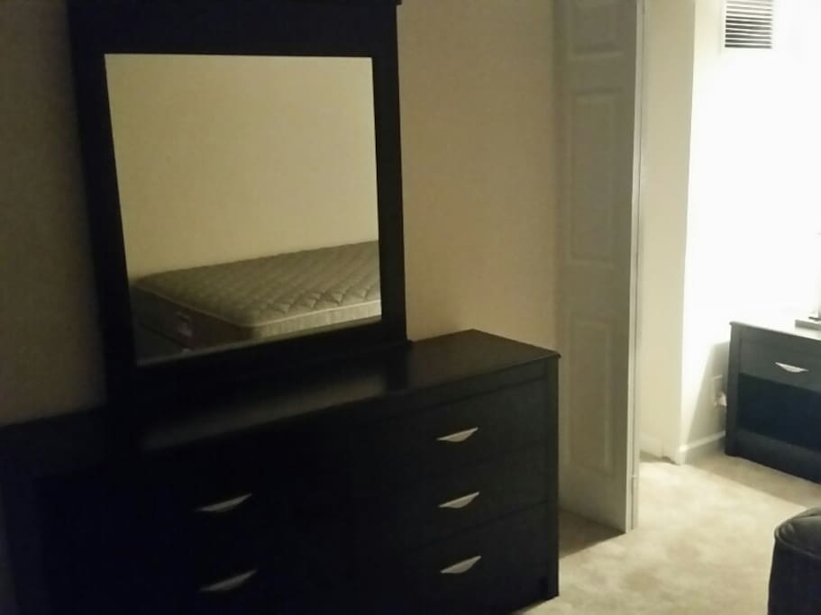 Dresser taken with poor lighting.