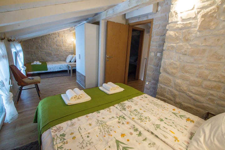 Bedroom with double bed and single bed