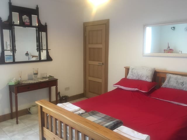 Modern self contained apartment. Tourist Board