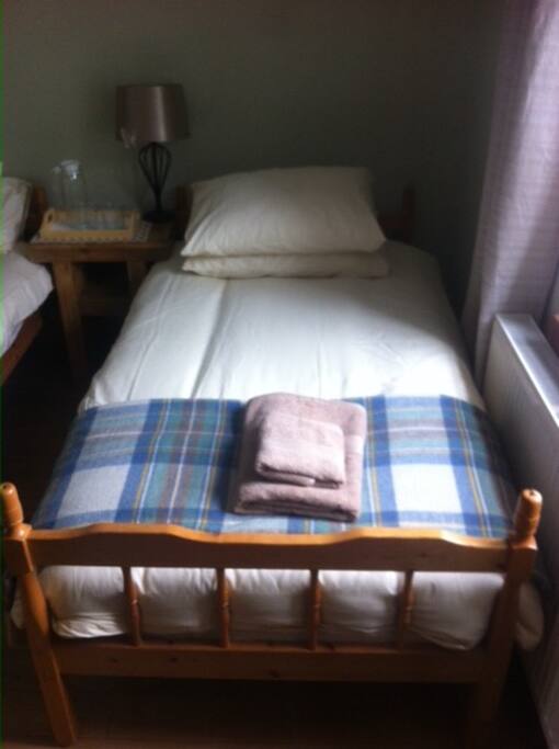 Two comfortable single beds for your stay.