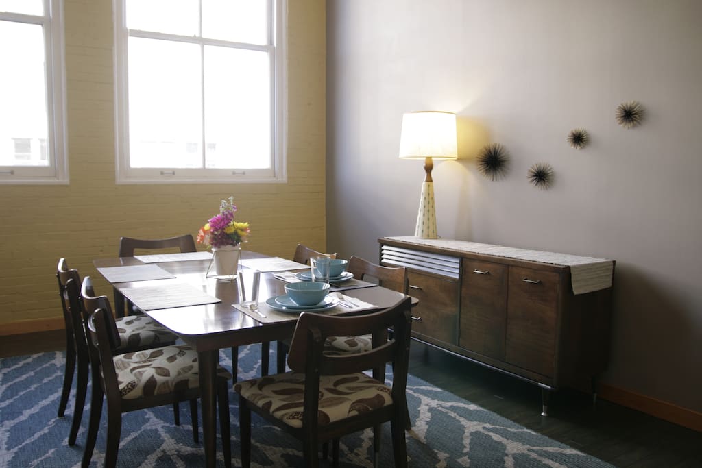 Set a meal for six at the MidCentury Modern dining table or clear the way to work on your latest work project.