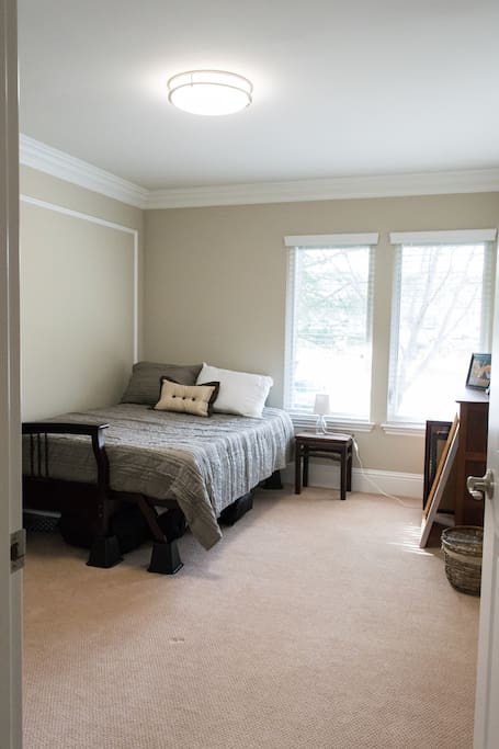 Light-filled private bedroom