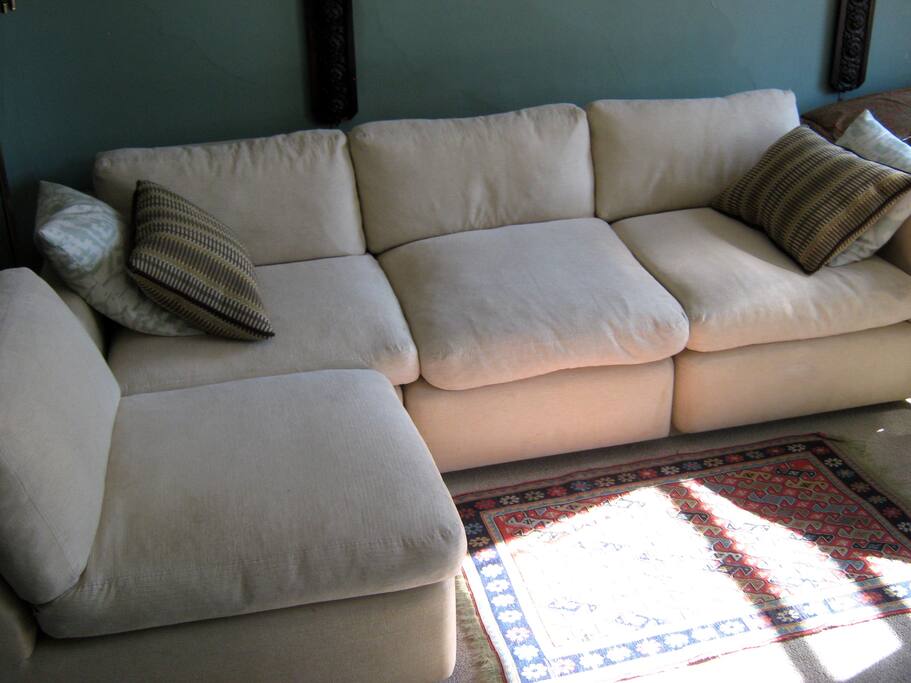 Sectional turns into a comfortable single bed with linens