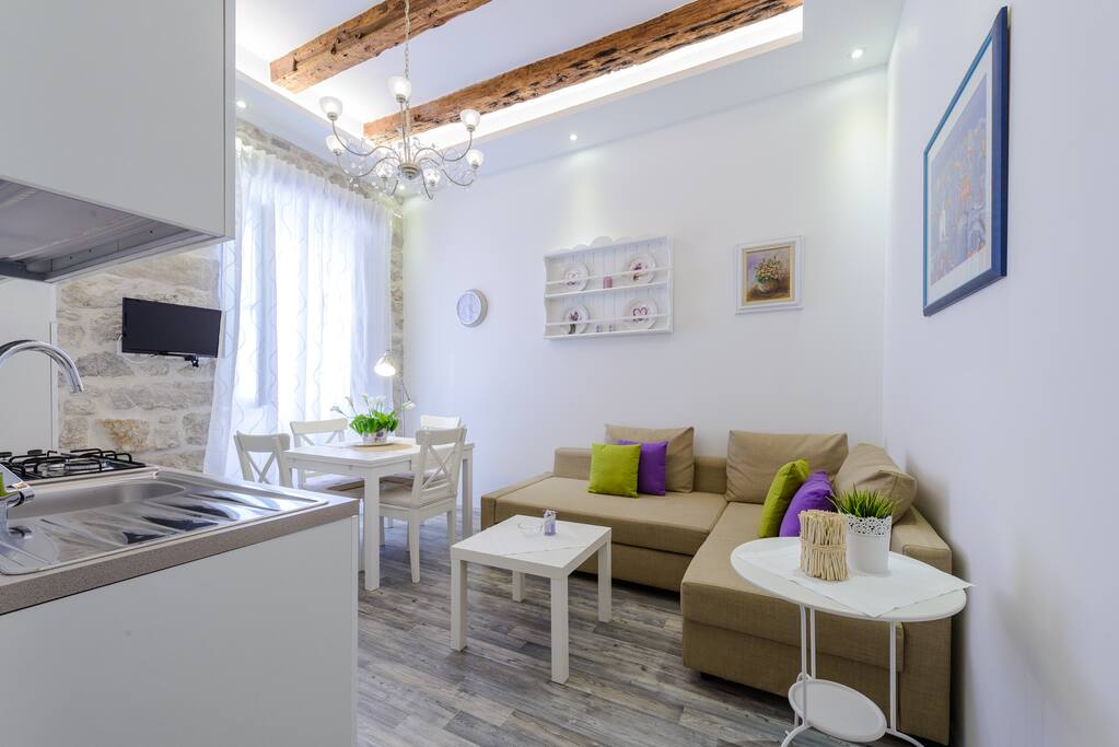 Spacious living / dining area with fully equipped kitchen, with TV SAT and air condition