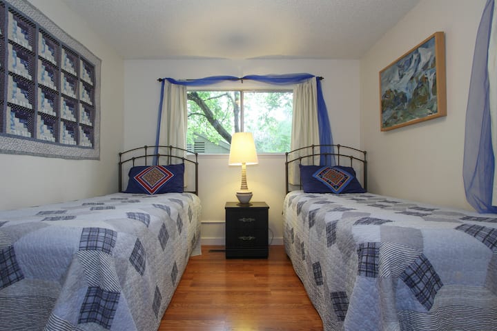 The Blue Room.  TwinXL beds join to make a King.