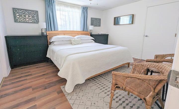 Second large bedroom with king sized bed and seating for 2.
Two large dressers offer plenty of extra storage space.
