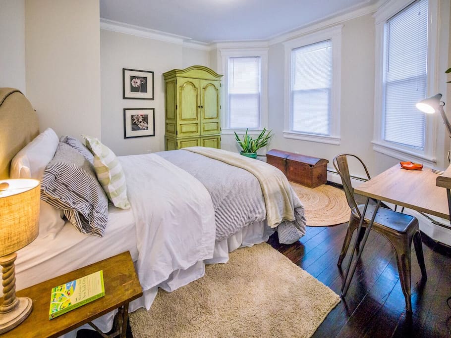 The green armoire has extra blankets, linens, and pillows for your use.