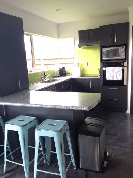 Kitchen - bear new dishwasher, electric stove/oven and full size fridge/freezer. Sandwich press, slow cooker, NutriBullet available in pantry. Dishwasher tablets etc supplied.