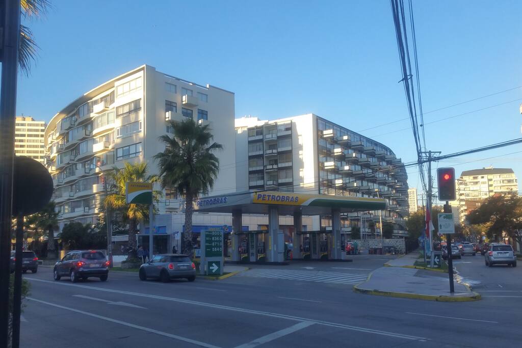 View of building from across the street highlighting the unique curved architectural design