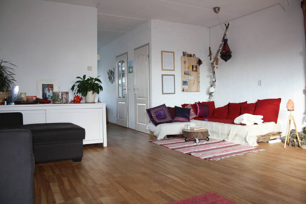living room with romantic seating and sleeping couch