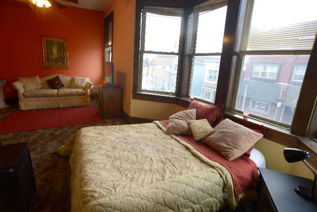 Sleeping Area, Queen Bed, nightstand.