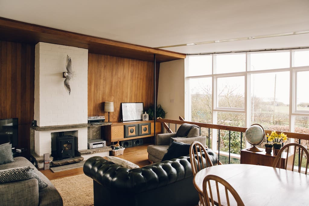 First floor lounge with sea views and log burner. Photo courtesy of India Hobson.