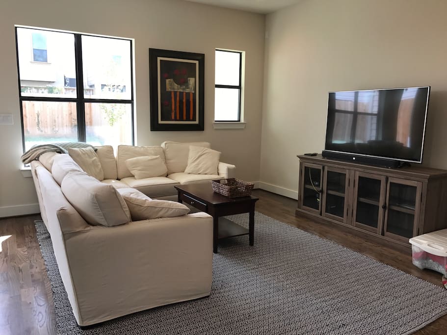 Comfortable sectional and 55" 4K TV in living room