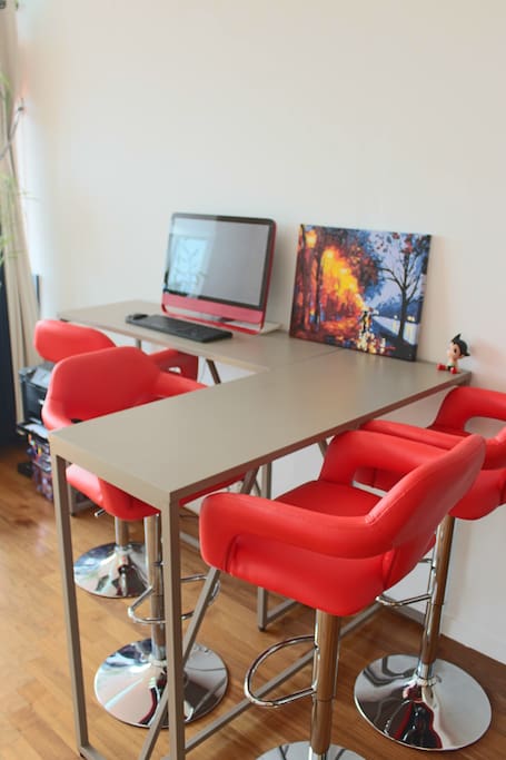 High table and chairs with a Beats Computer connected to the net and free Wifi with Printer and Scanner.
