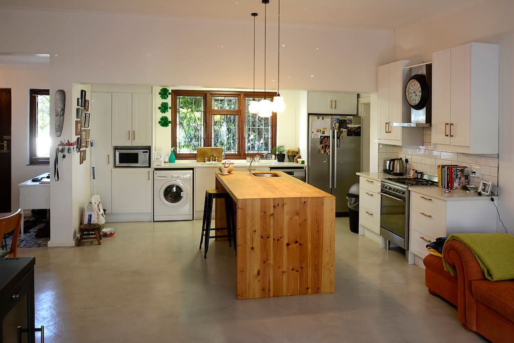 Large modern kitchen with double fridge and gas cooker