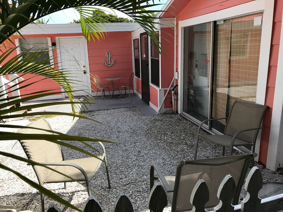 Front door, next to anchor, to our Cozy Cottage. To right is the Game room. To right of that is the washer & Dryer room.