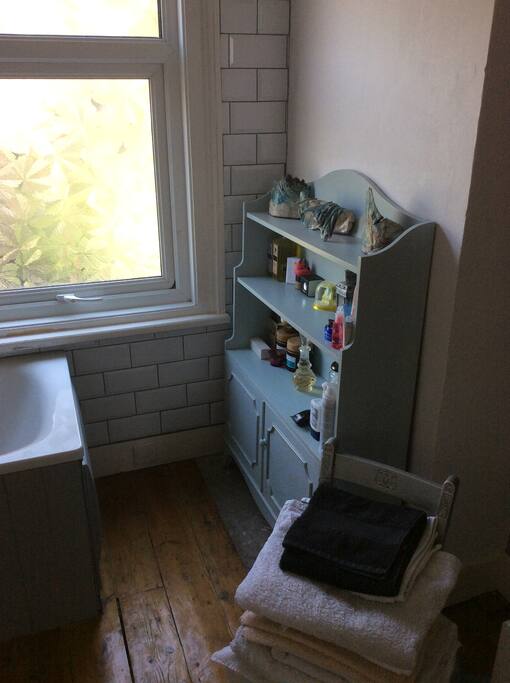Happy for you to help yourself to bubble bath from this little dresser in the bathroom...