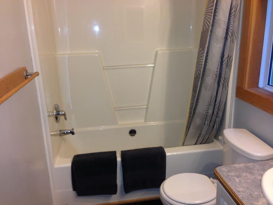 Your own bathroom with full sized bathtub.