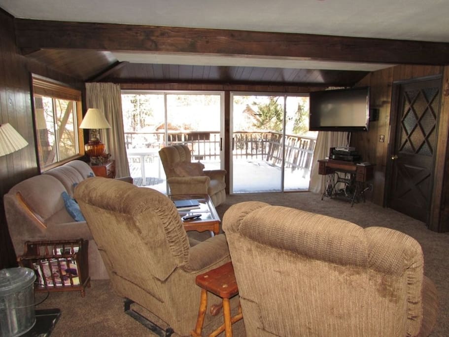 Open Living Room With a Flat Screen TV