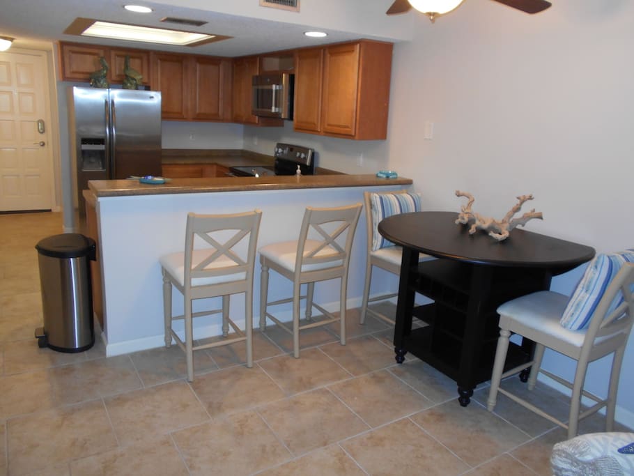 Dining Area- table features side leafs which can support 4-6 guests.