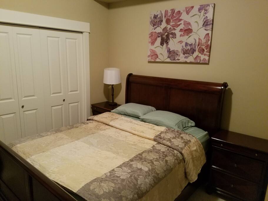 Bedroom with Closet and King Size Bed