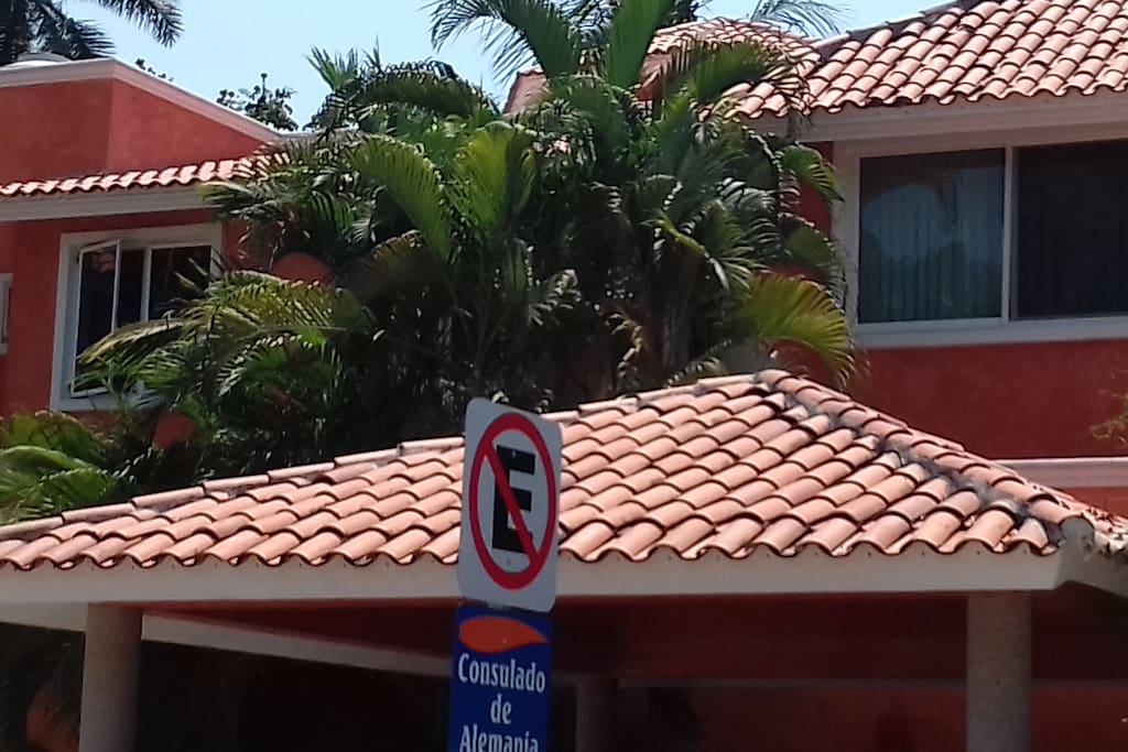 Windows of apartment overlooking Paseo de las Golondrinas